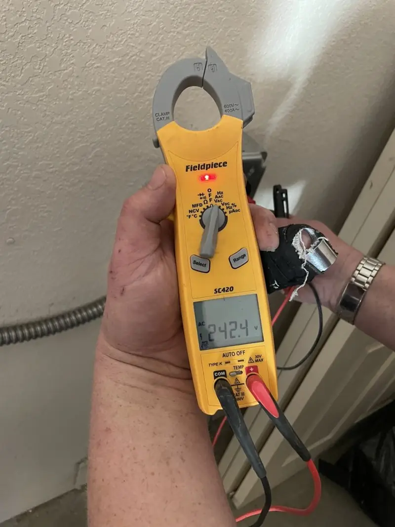 Voltage testing with clamp meter during Hot Tub / Pool Electrical Wiring in Florissant